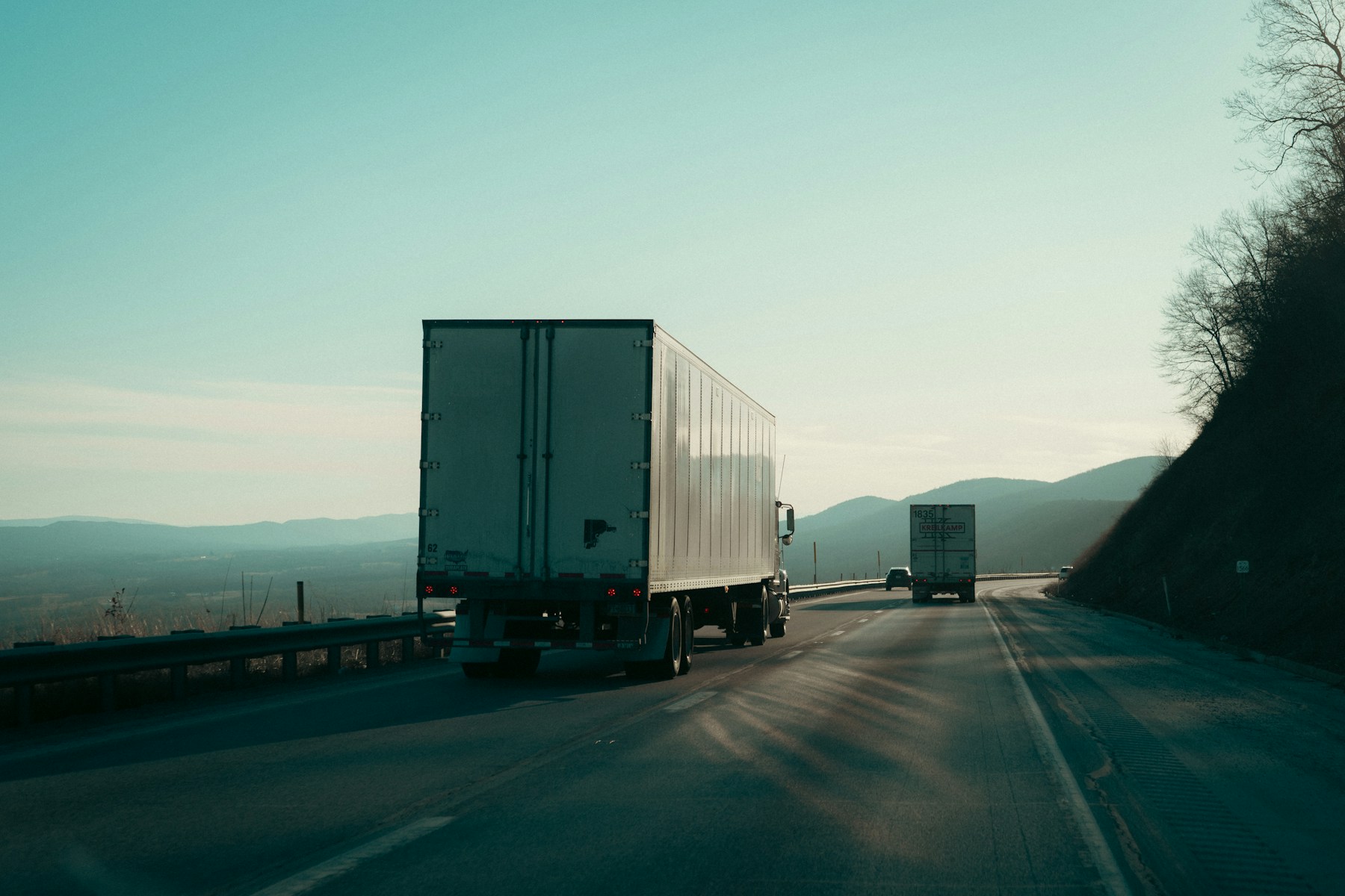 Trucks traveling on an open highway